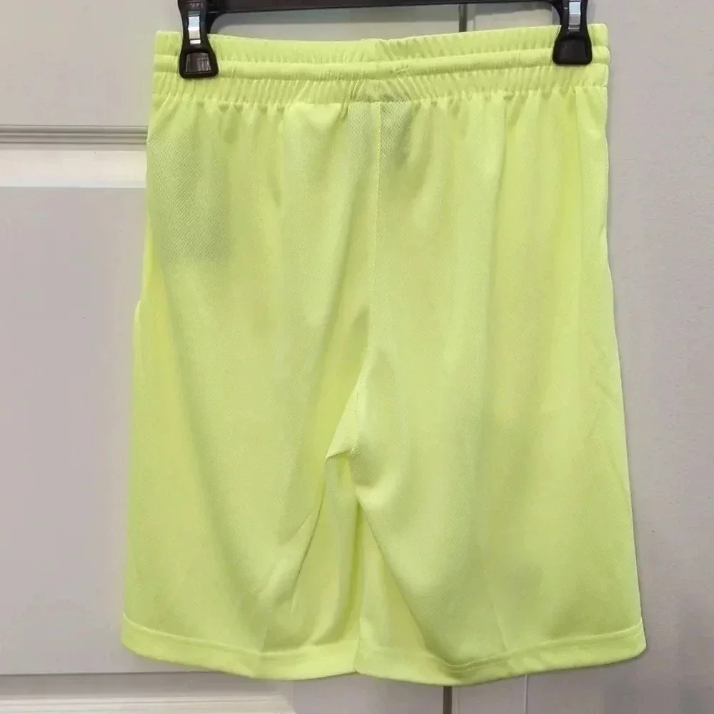 BOYS neon green Nike shorts